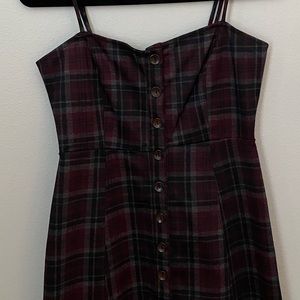 Plaid dress worn once in new condition.